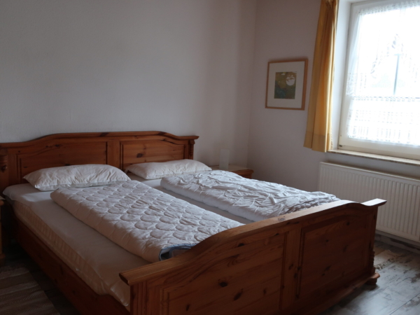 Schlafraum unten Ferienhaus Deichkoenig Nessmersiel